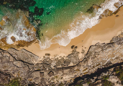 High angle view of rocks on beach