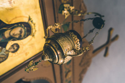 Close-up of curtain hanging on wall