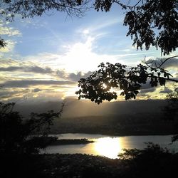 Scenic view of sunset over river