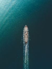High angle view of boat sailing on sea