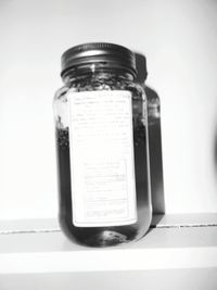 Close-up of glass jar on table