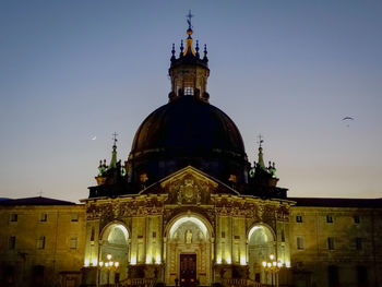 View of building against clear sky at dusk