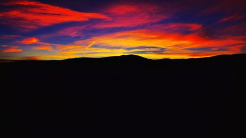 Scenic view of silhouette at night