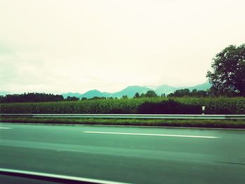 Scenic view of road against clear sky