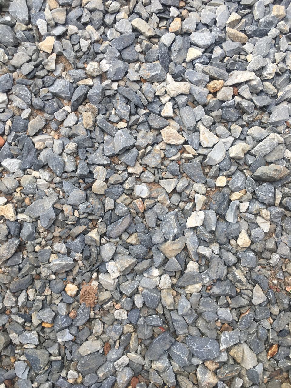 HIGH ANGLE VIEW OF STONES ON STONE