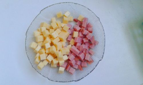 Directly above shot of chopped fruits in bowl on table