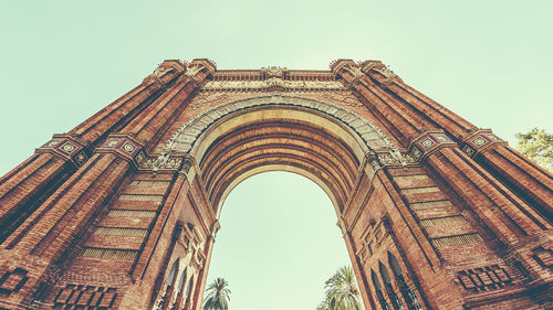 Low angle view of historical building against clear sky
