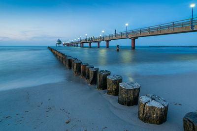 Pier on sea against sky