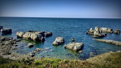 Scenic view of sea against clear sky