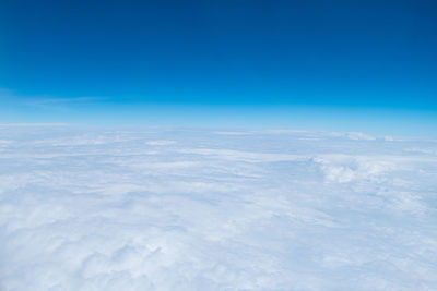 Aerial view of cloudscape against blue sky