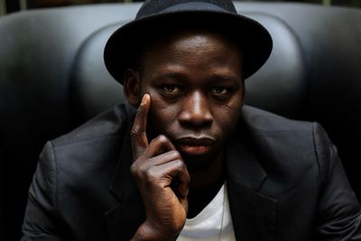 Portrait of young man wearing hat