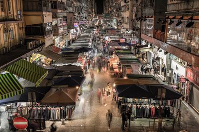 High angle view of people on street at night