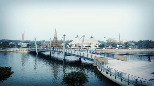 Bridge over river against sky