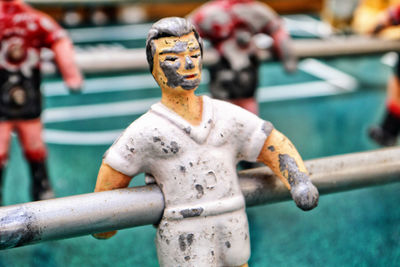 Close-up of statue on foosball