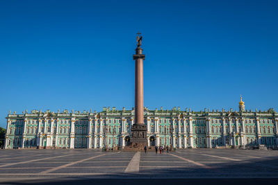 Low angle view of building against blue sky