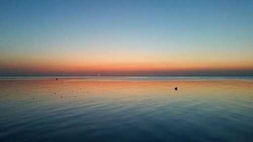 View of calm sea against clear sky