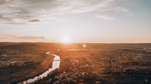 High angle view of townscape against sky during sunset