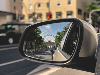 Reflection of road on side-view mirror