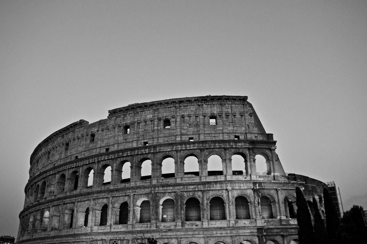 architecture, built structure, history, building exterior, famous place, low angle view, tourism, travel destinations, international landmark, ancient, clear sky, travel, culture, old ruin, coliseum, arch, the past, ancient civilization, unesco world heritage site, amphitheater