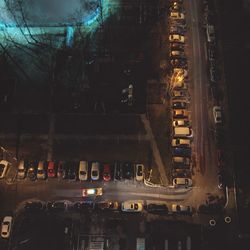 Cars on illuminated city at night