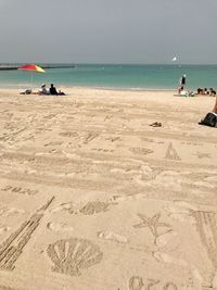 Rolled out sand at the beginning of a  beach day on jumeirah beach in dubai