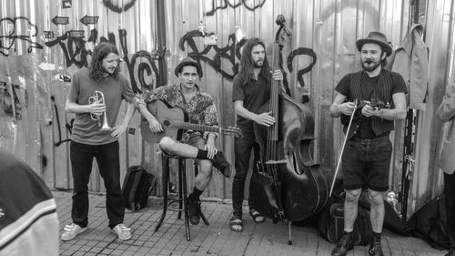 Portrait of people standing on stage