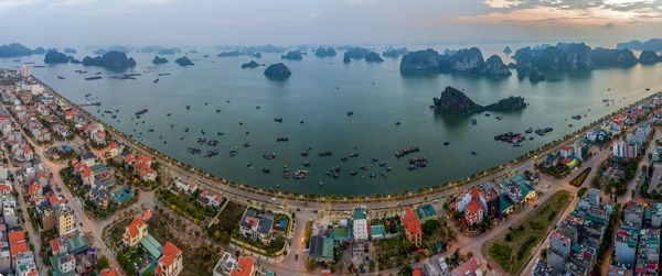 High angle view of crowd in city against sky