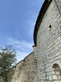 Low angle view of historical building against sky