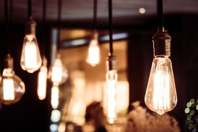 Close-up of illuminated light bulb