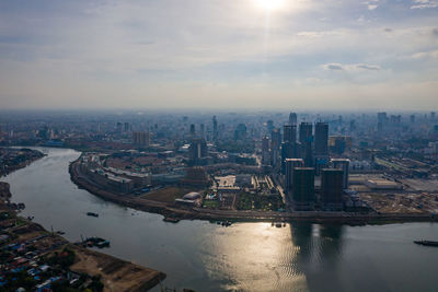 High angle view of river amidst buildings in city