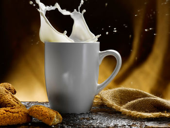 Close-up of coffee cup on table