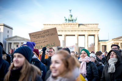 Group of people in front of building