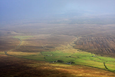 High angle view of field against sky