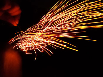 Firework display at night