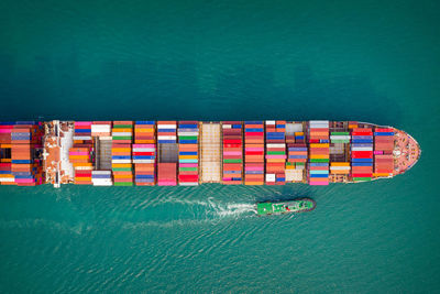 High angle view of container ship in sea