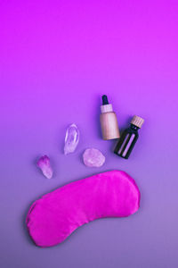 High angle view of purple and pink flowers on table