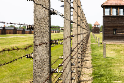 Barbed wire around the auschwitz-birkenau concentration camp. oswiecim, poland, 16 may 2022