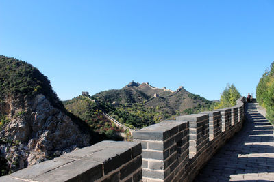 Panoramic view of mountain against blue sky