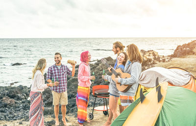 Cheerful people enjoying on the beach