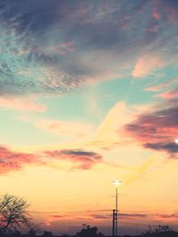 Scenic view of dramatic sky at sunset