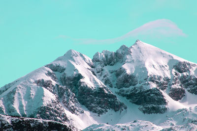 Scenic view of mountains against clear blue sky