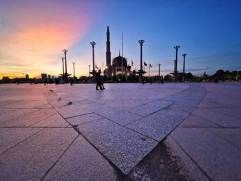 Panoramic view of city against sky during sunset