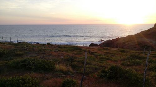 Scenic view of sea at sunset