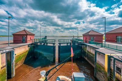 Coastal protection structure, lock and barrage leysiel near greetsiel, germany.