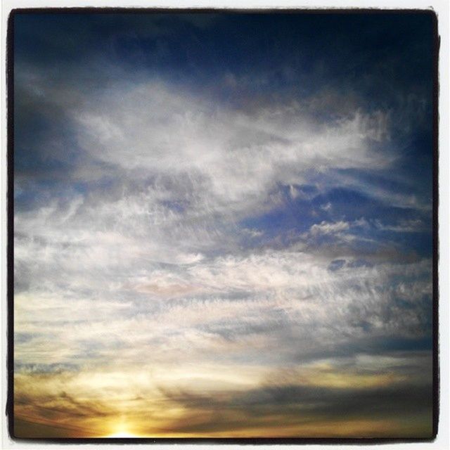 sky, cloud - sky, beauty in nature, transfer print, scenics, sunset, tranquility, tranquil scene, low angle view, cloudy, auto post production filter, nature, sky only, cloudscape, idyllic, cloud, backgrounds, dramatic sky, weather, overcast