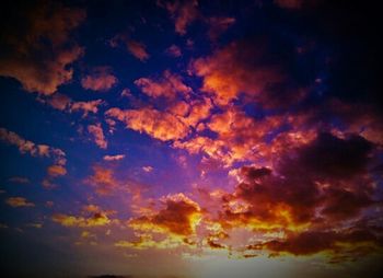 Scenic view of dramatic sky during sunset