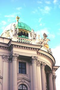 Low angle view of building against blue sky