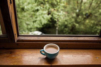 Close-up of coffee cup on table