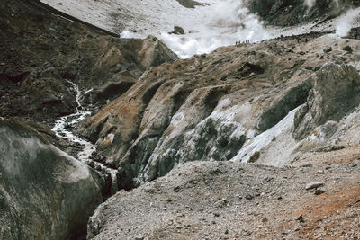 Scenic view of rocky mountains inside of volcano crater