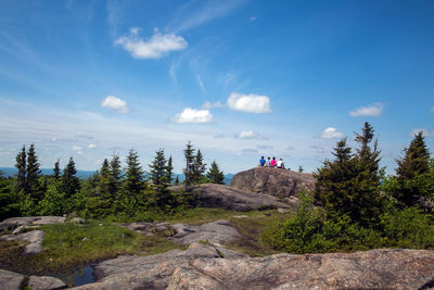 Scenic view of mountain against blue sky